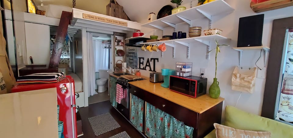 Full kitchen with microwave, gas range/oven, sink, toaster and Keurig machine