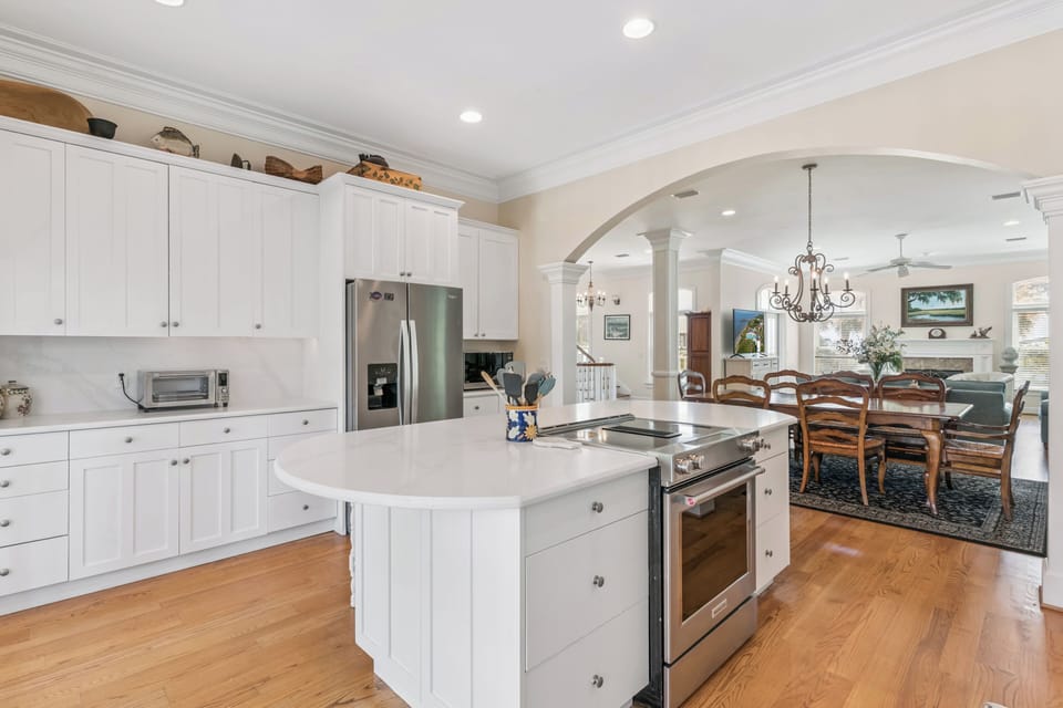 A bright, open kitchen flows seamlessly into the dining area, where you'll find everything you need to cook and share memorable meals together.
