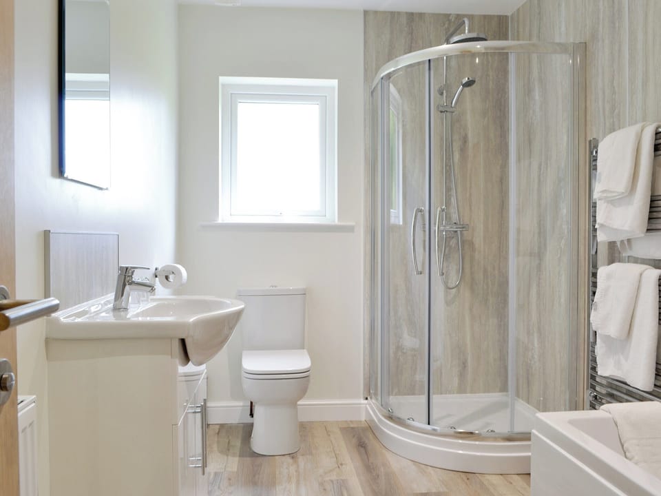 Family bathroom with bath and separate shower room | Lucy&rsquo;s at the Grange - Grange Country House Holiday Cottages, Loweswater, near Cockermouth