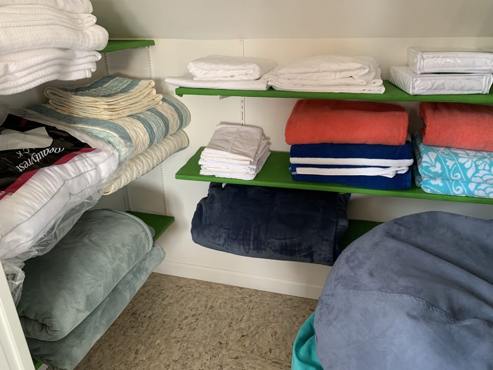 Extra linens and bedding in upstairs closet
2 bean bag chairs
