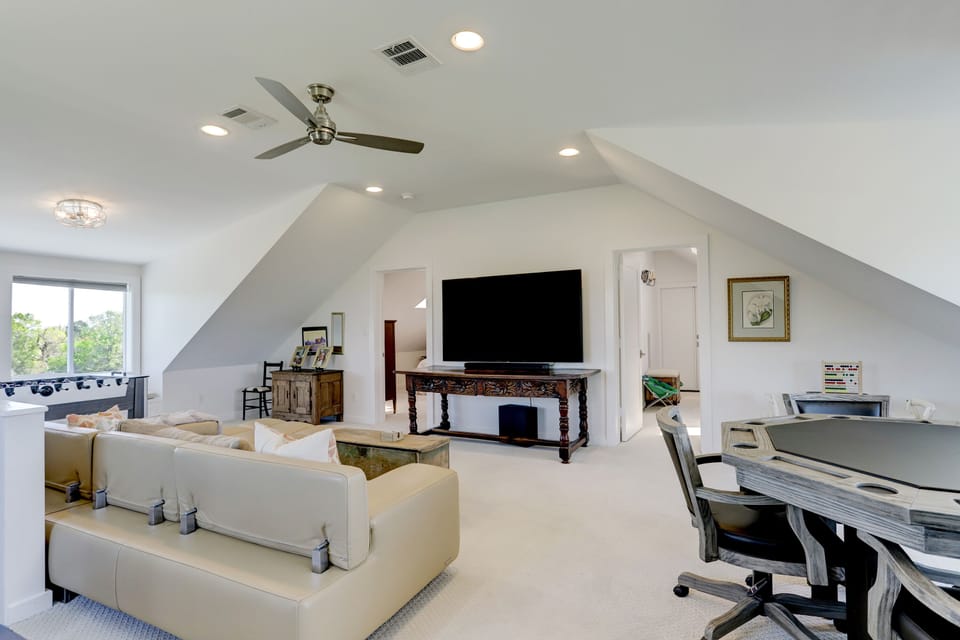 Upstairs gameroom, 85 inch TV, foosball, poker table, bumper pool table