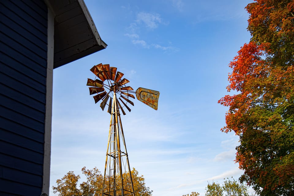 Original Aeromotor windmill above original dug well.