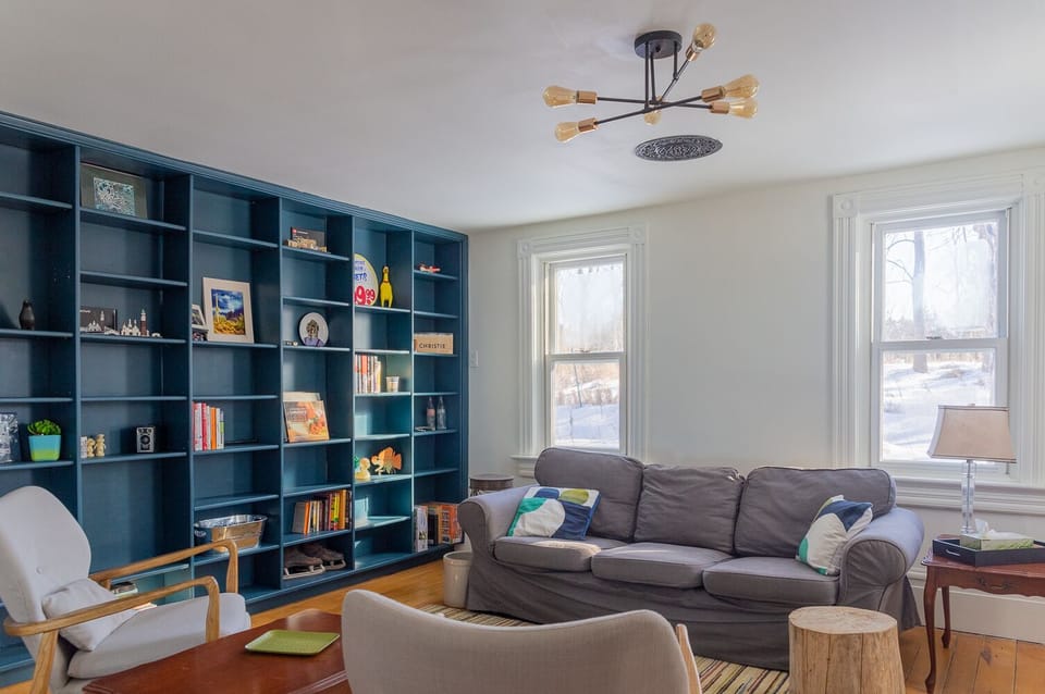 Enjoy a quiet read and sunshine all day long in the library/music room.