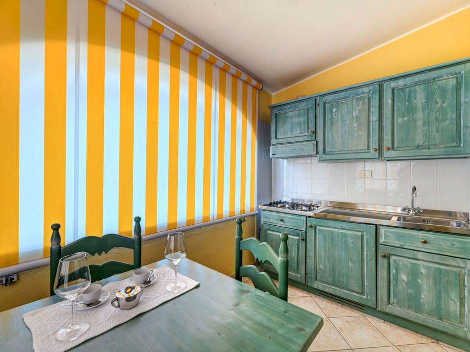 Property, Cabinetry, Kitchen Sink, Sink, Building, Table, Lighting, Interior Design, Architecture, Chair