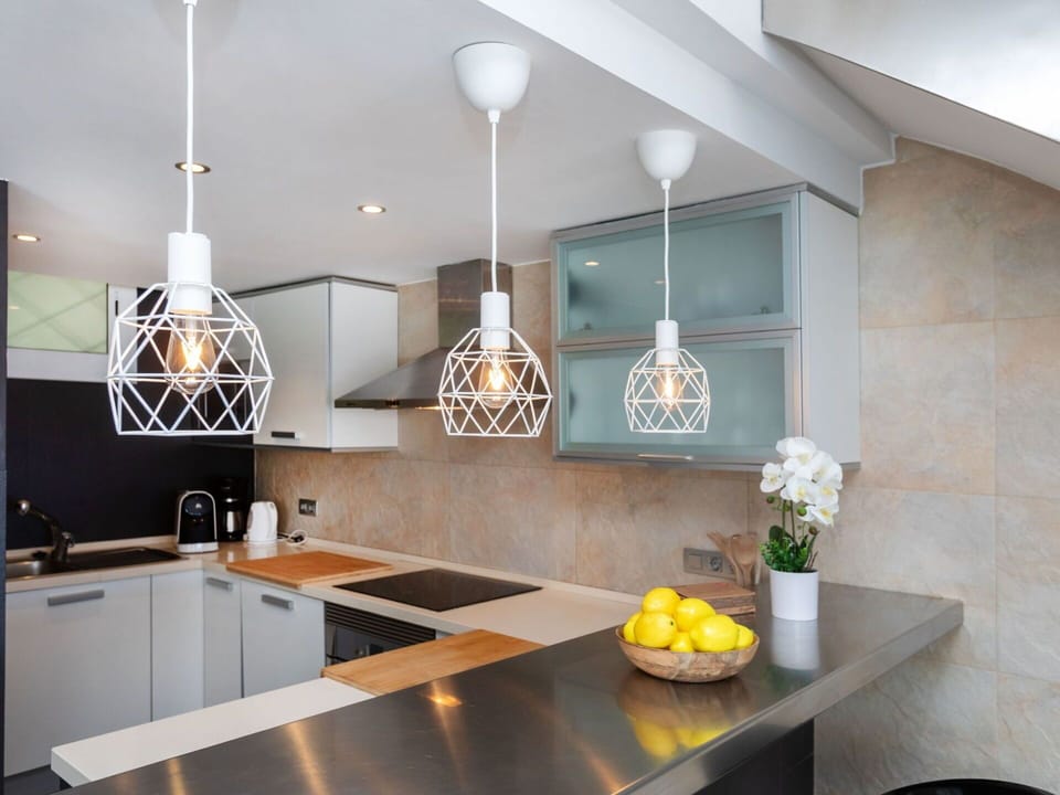 Property, Cabinetry, Countertop, Table, Plant, Sink, Wood, Interior Design, Lighting, Kitchen