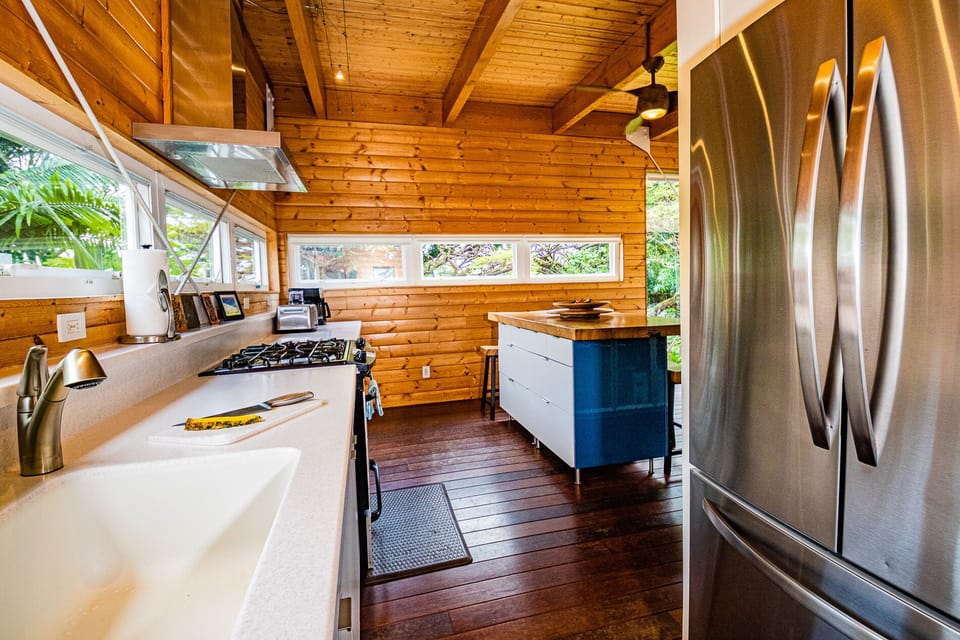 Hale Ohai kitchen with dishwasher, large fridge, gas range
