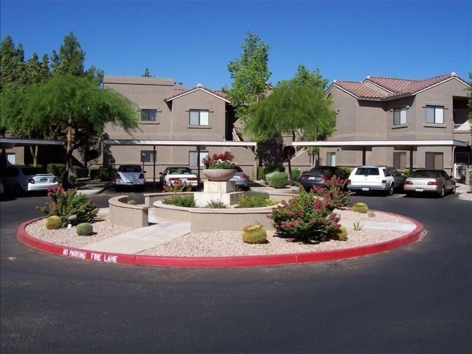 Front of building & carport area