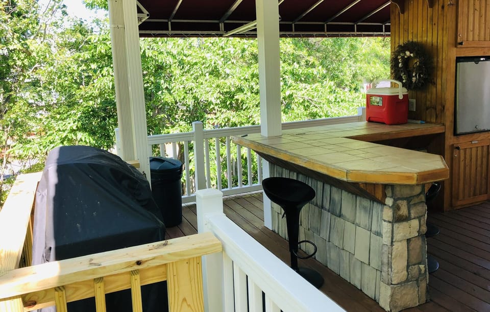 Outdoor grill on 1st level on the home. Easy access to the kitchen. 