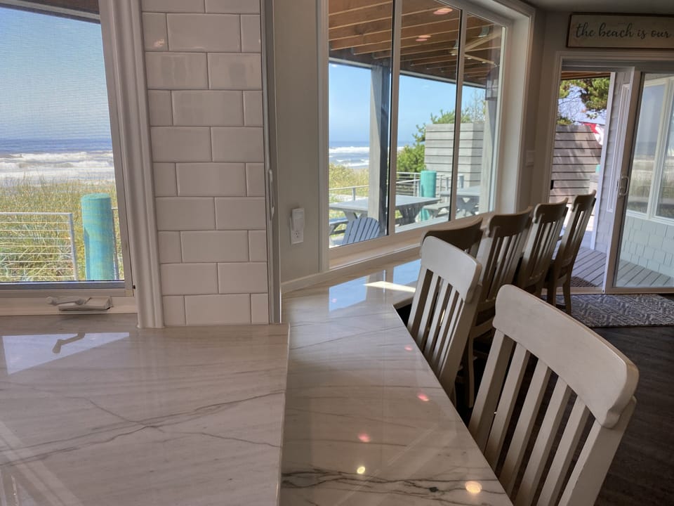 Slab quartzite eat up bar with ocean view. Seating here for 6 