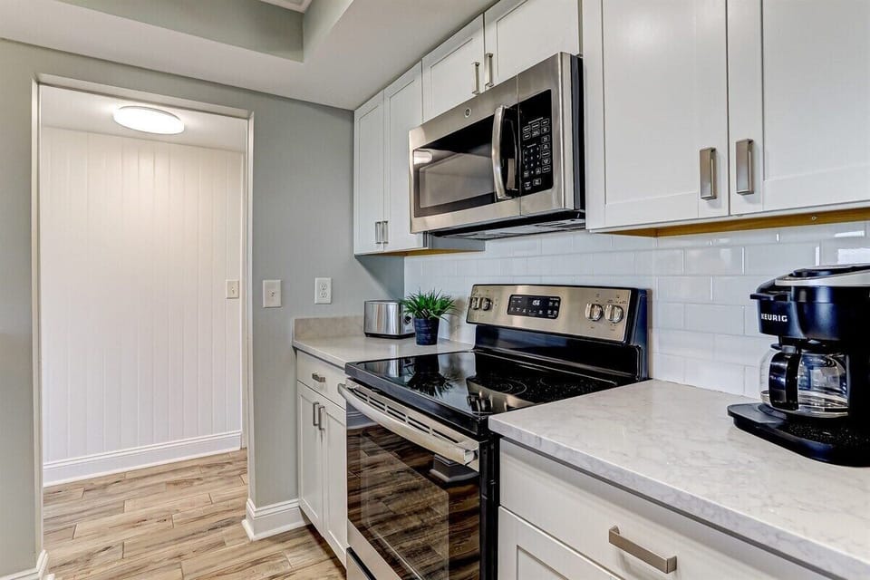 Bright White Subway Tile and Cabinets