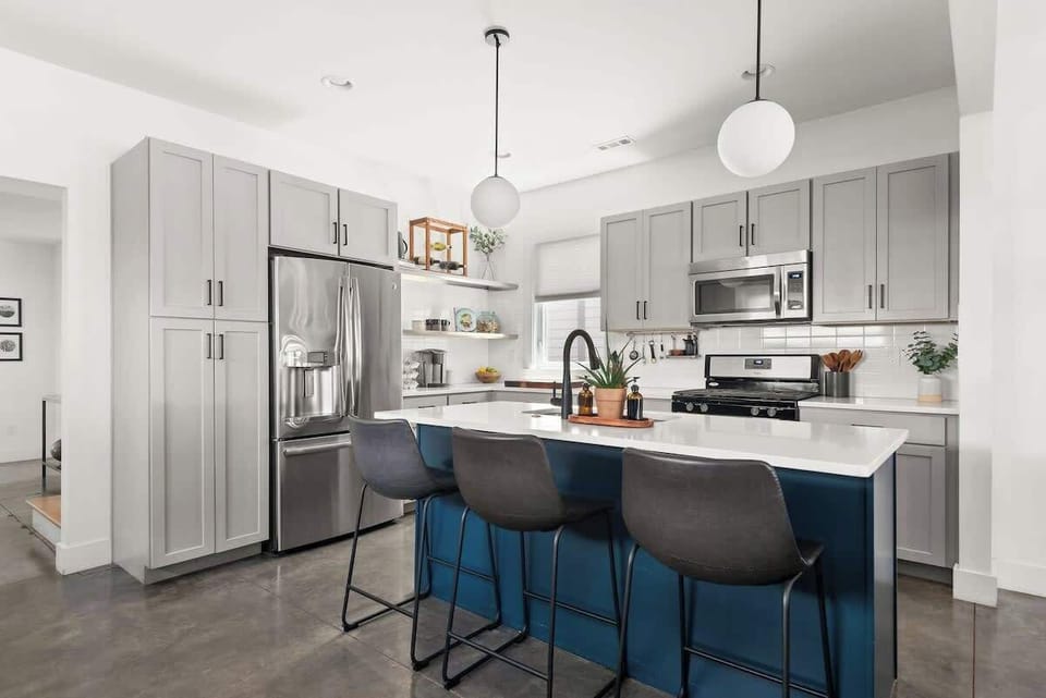 You will not be disappointed when you open the cabinets in this modern kitchen.  We have everything that you could possibly need - sous vide, spices, nutri-bullet, also all of the necessary plate and silverware to enjoy a wonderful dinner.
