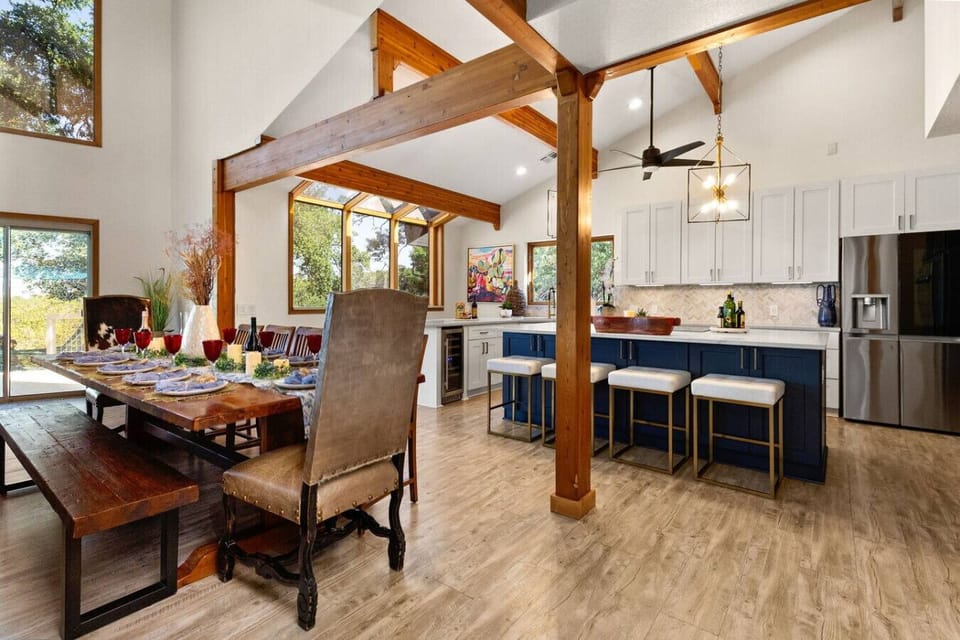 Large indoor natural wood dining table makes for great family gatherings whether casual or formal.