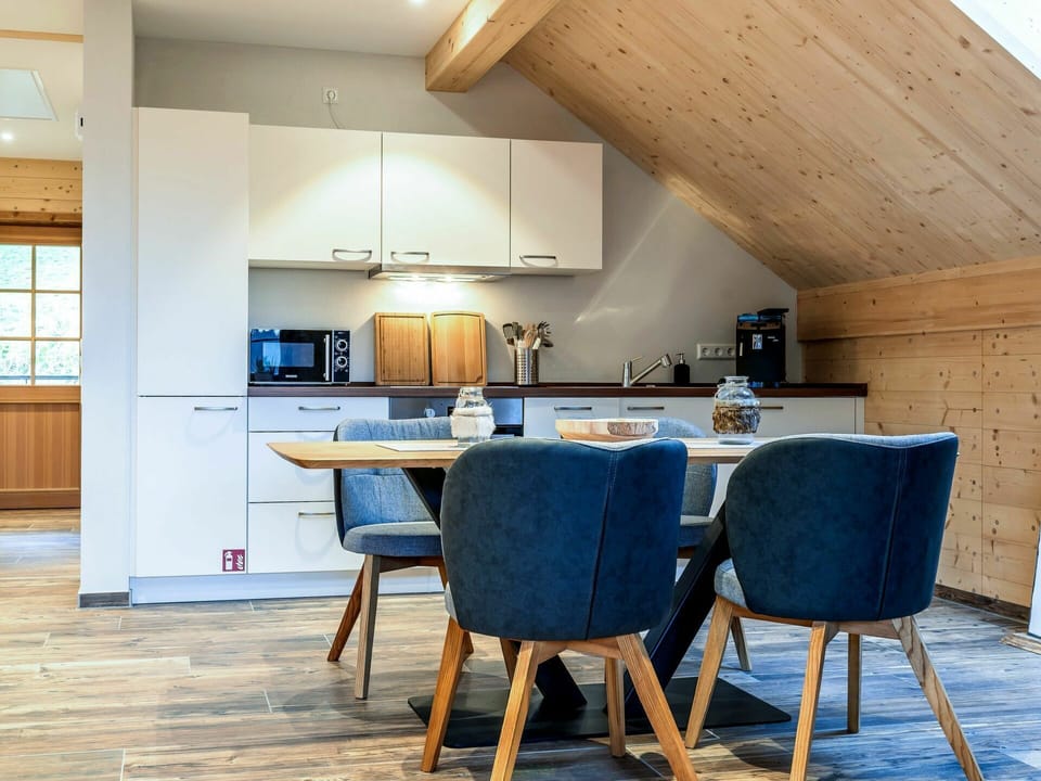 Table, Furniture, Property, Cabinetry, Chair, Countertop, Wood, Interior Design, Kitchen & Dining Room Table, Flooring