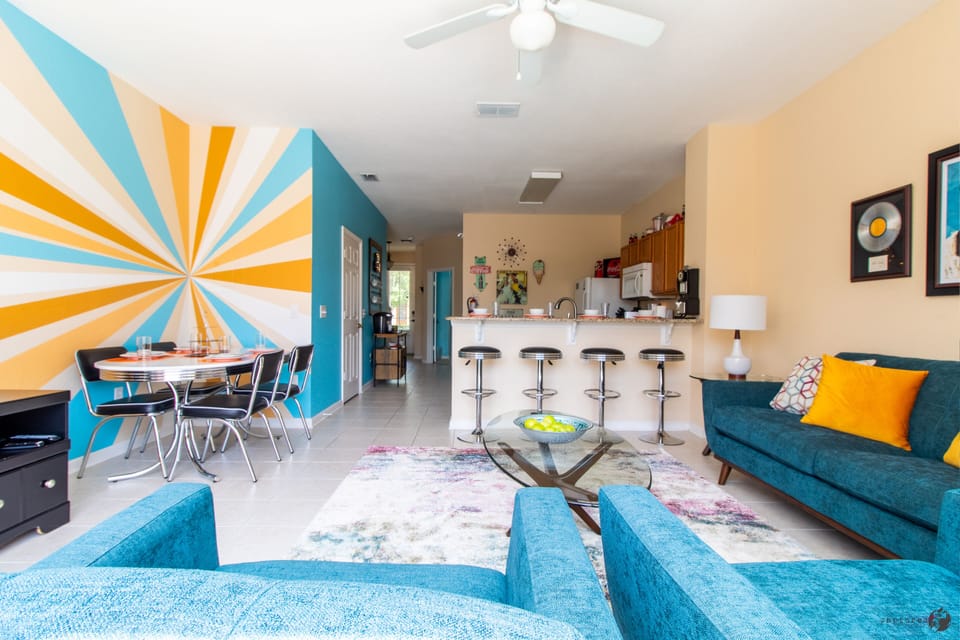 Custom painted backdrop • Comfortable casual • Stylish Diner-style dining