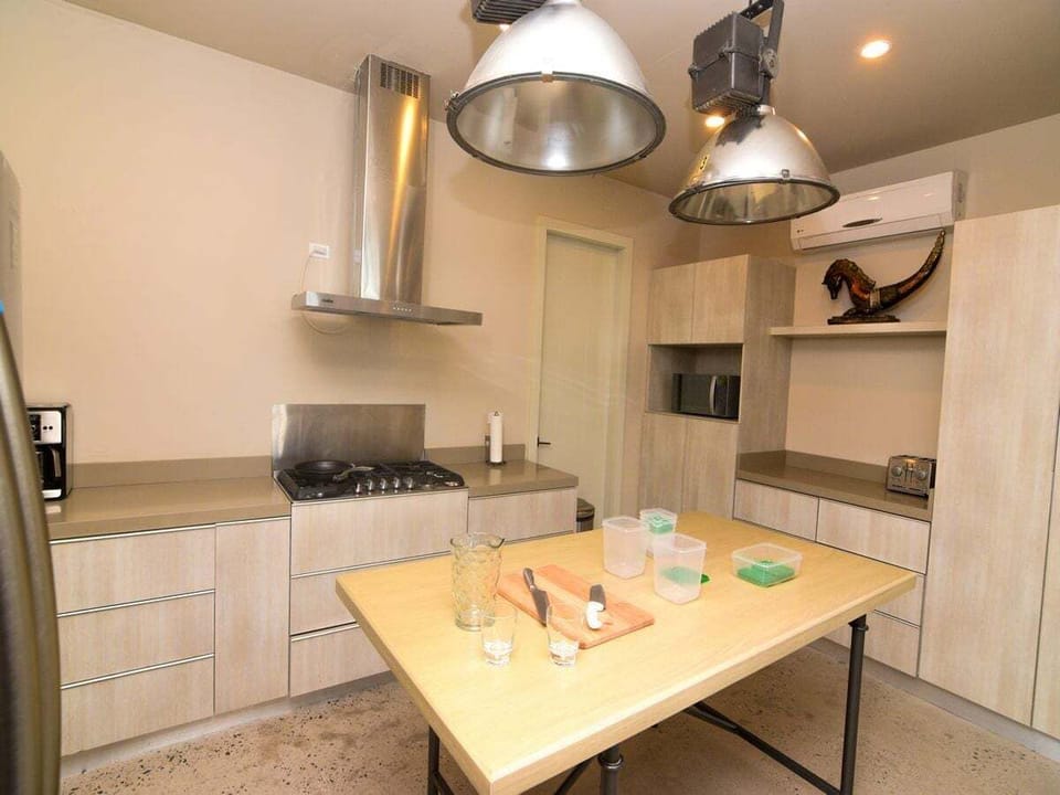 Full kitchen with stove, fridge, and counter space at Casa Playa Vista in La Hacienda San Felipe BC — perfect for home cooking.