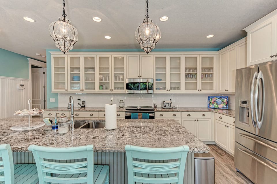 Blue Palm Paradise kitchen view from living room