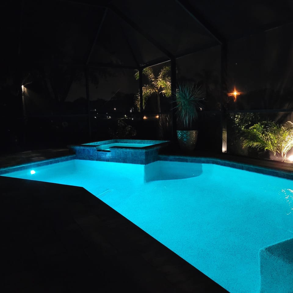 Enjoy the pool and spa day or night.