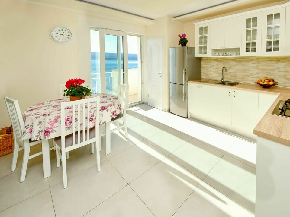 Furniture, Cabinetry, Window, Flower, Countertop, Chair, Houseplant, Plant, Wood, Interior Design