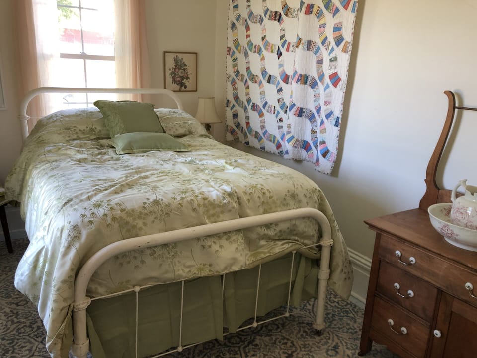 North bedroom downstairs with full size bed
