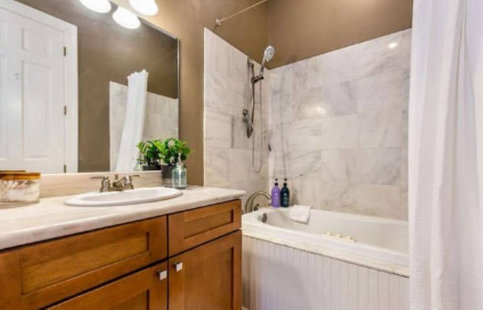 Bathroom with large soaking tub and shower