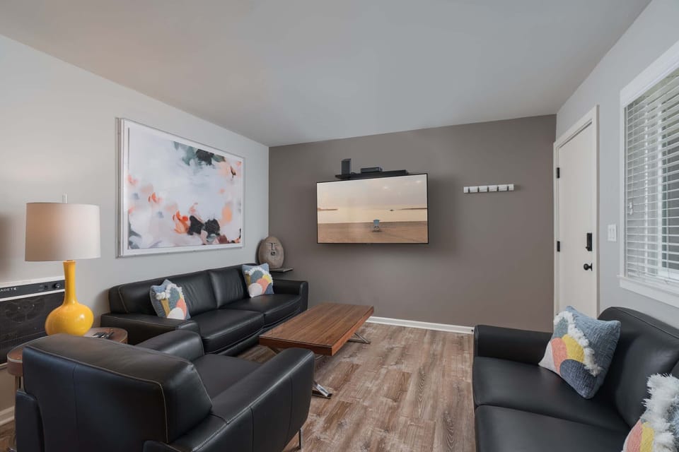 Living room with 65" flat screen t.v.