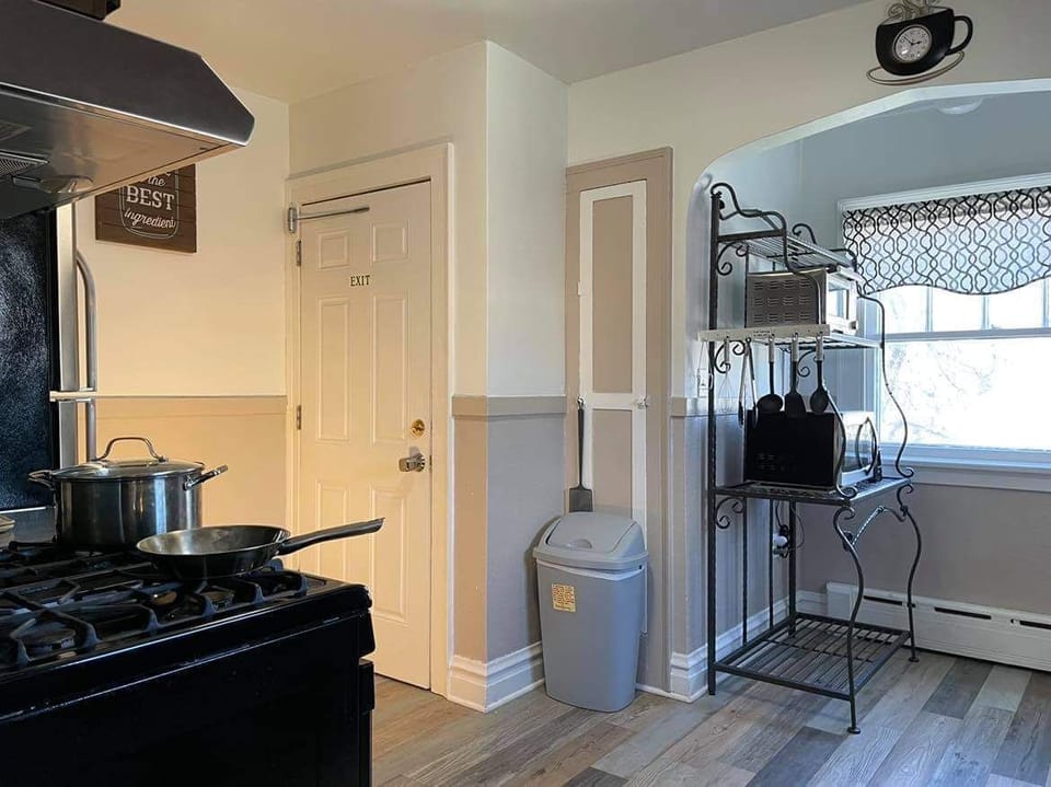 Kitchen facing back Exit door