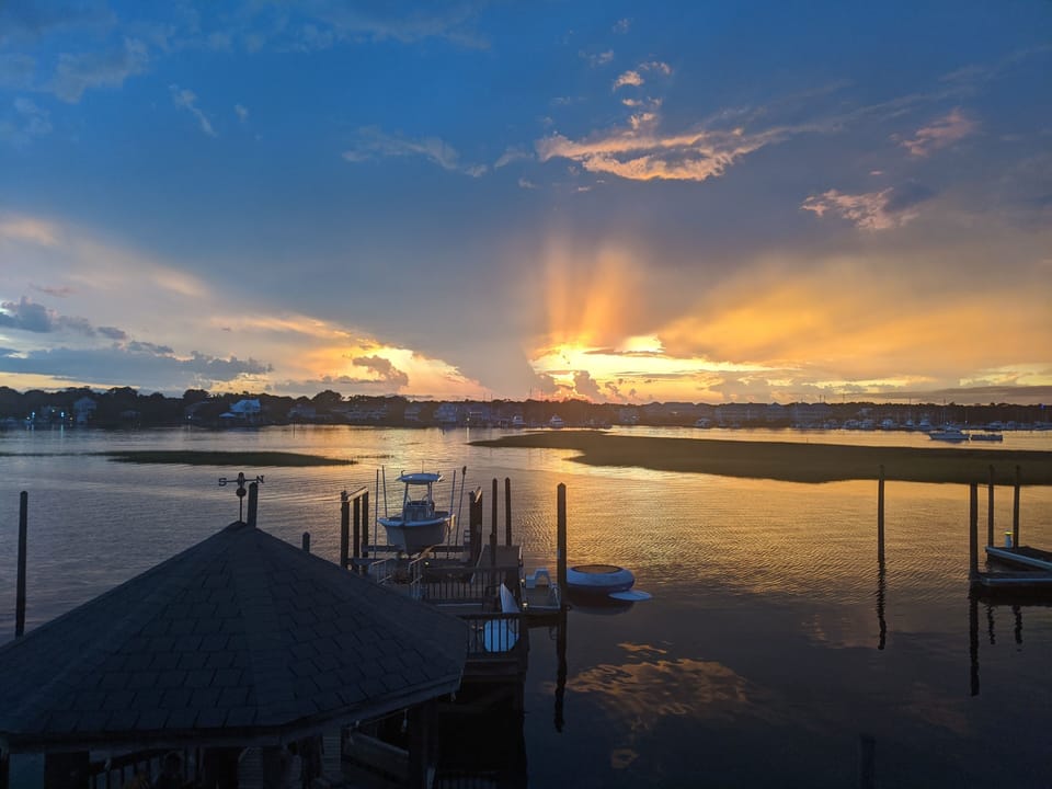 The back deck with ample seating is a great place to enjoy the sunsets.