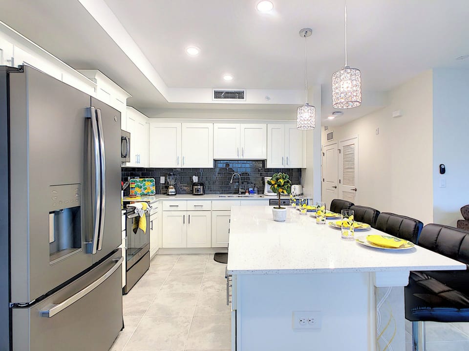 Modern Kitchen with Island Seating and Stainless Appliances
