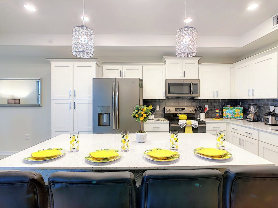 Modern Kitchen with Island Seating and Stainless Steel Appliances