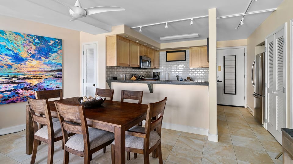 Poipu Shores A104 - Dining Area & Kitchen - Parrish Kauai