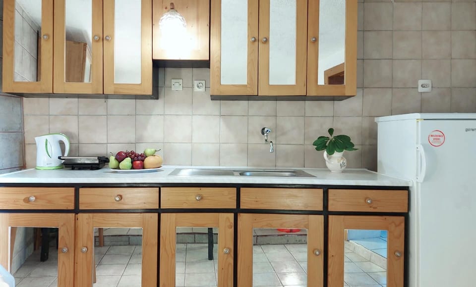 Separate Kitchen on ground floor with gas stove
