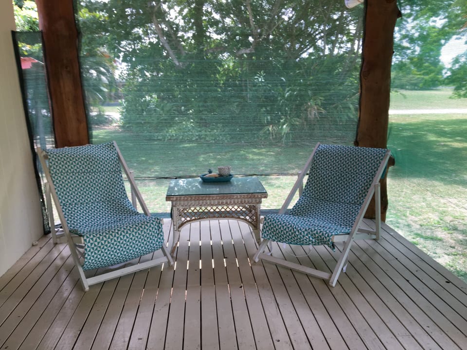 Front deck ,a space to relax . Outside main bedroom.