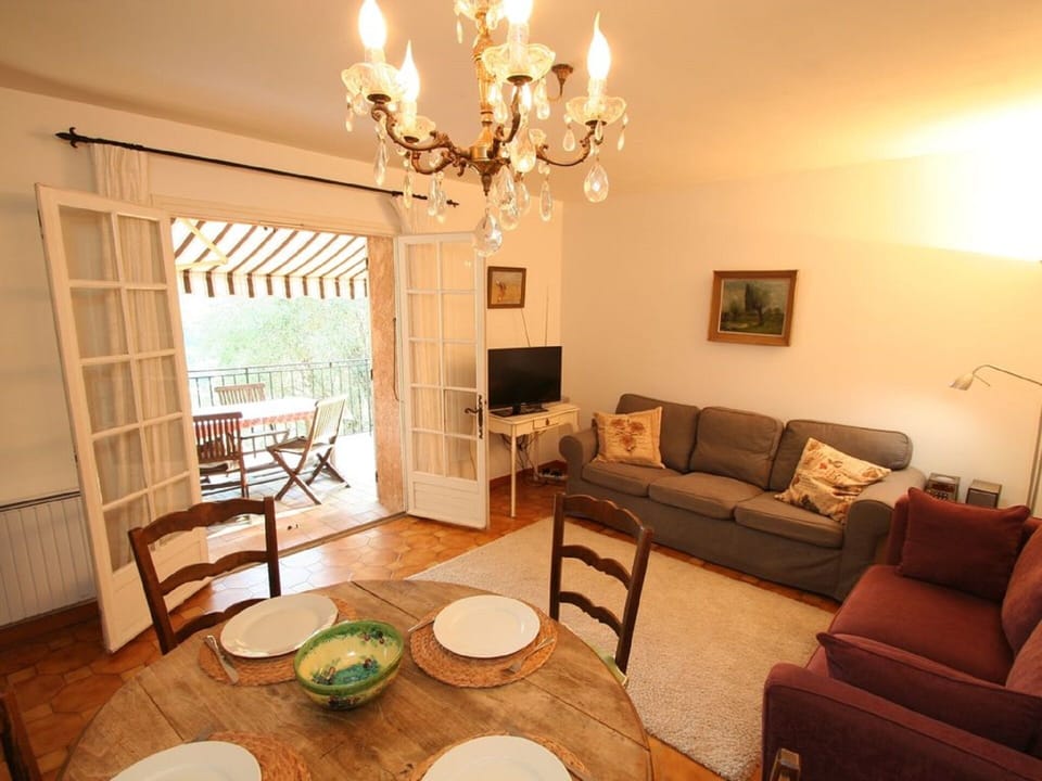 Lounge and dining area leading to large balcony/terrace