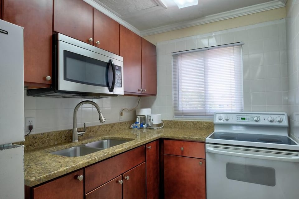 Your kitchen with Microwave, Oven, Stove, Drip coffee maker