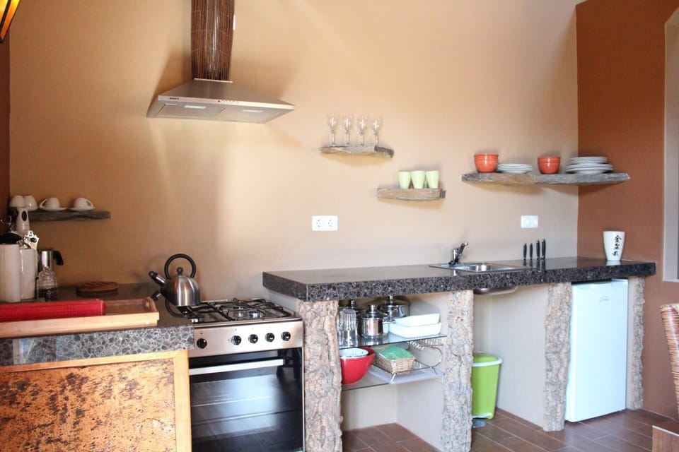 Kitchen area. Functional rural kitchen with natural elements