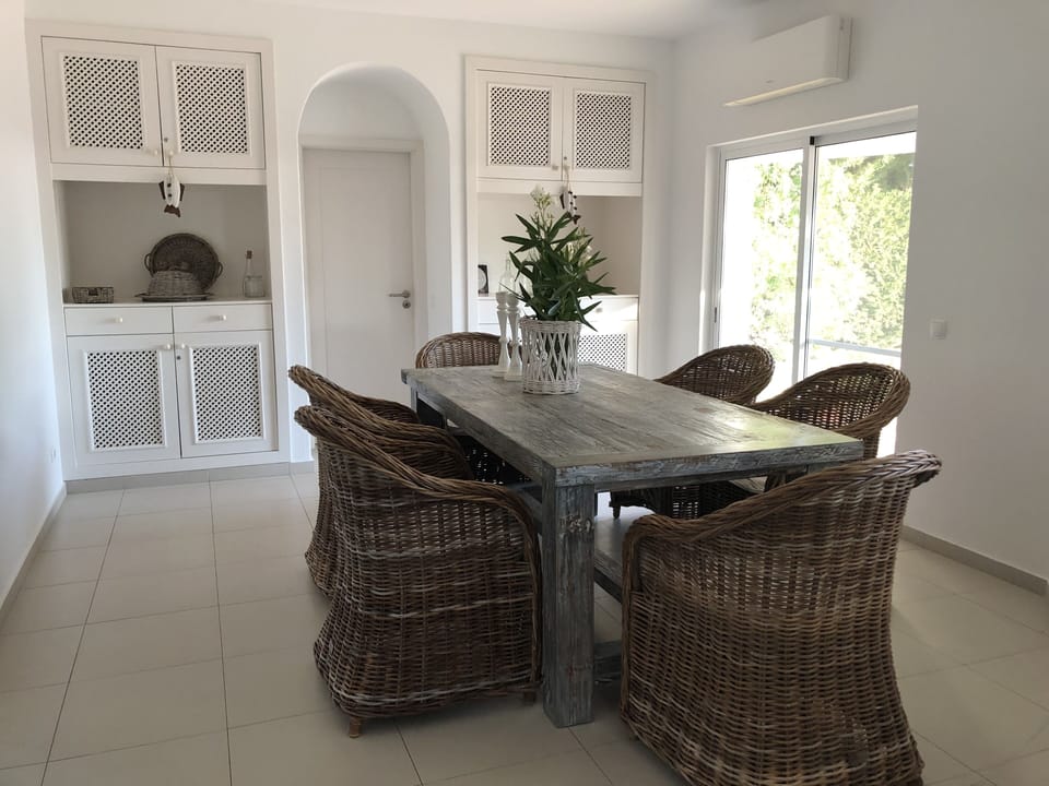 Dining area has connection with the laundry.