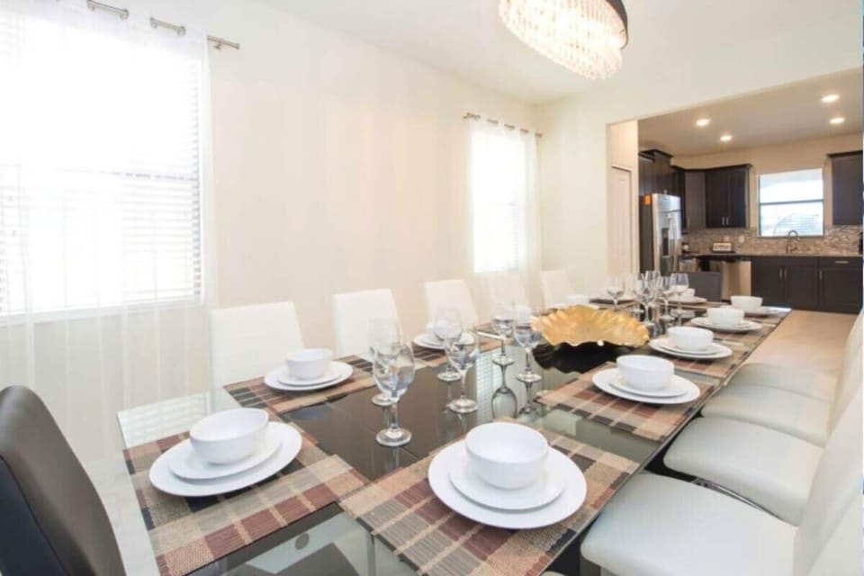 A gorgeous plush modern dining room area.