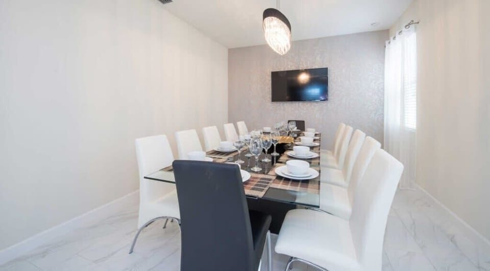 Dining room table that comfortably seats 12.