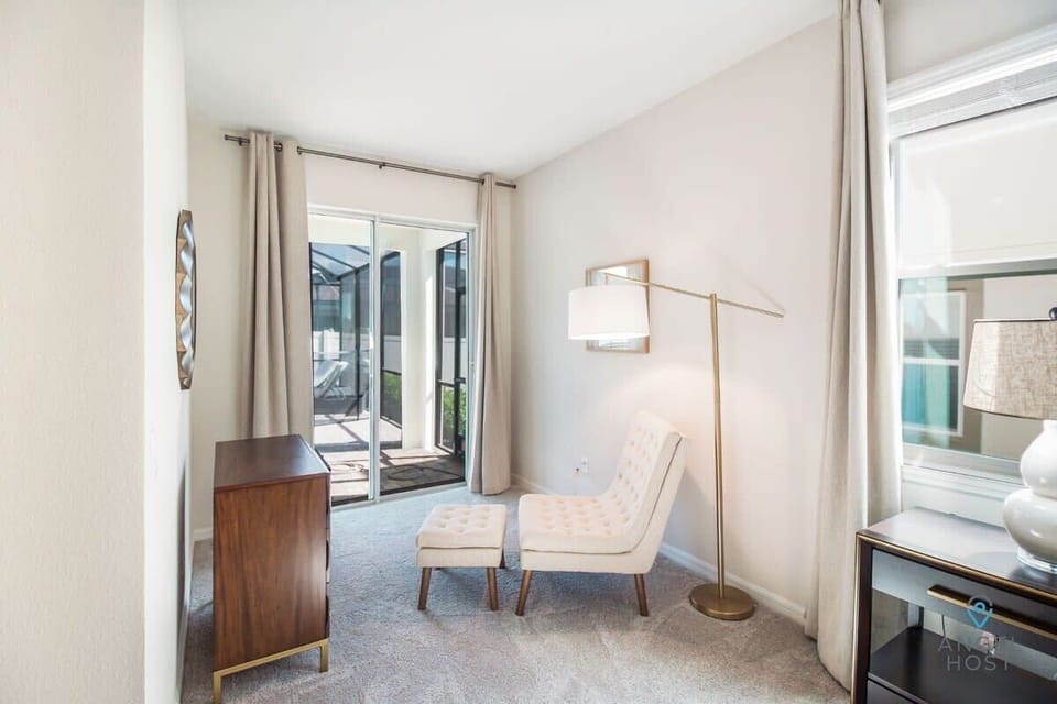Patio doors in Bedroom 1 let in abundant natural light while keeping privacy.