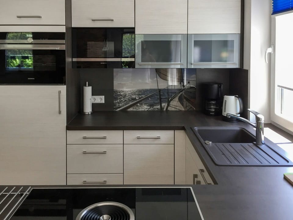 Countertop, Property, Room, Kitchen, Cabinetry, Furniture, Kitchen Stove, Interior Design, Building, House