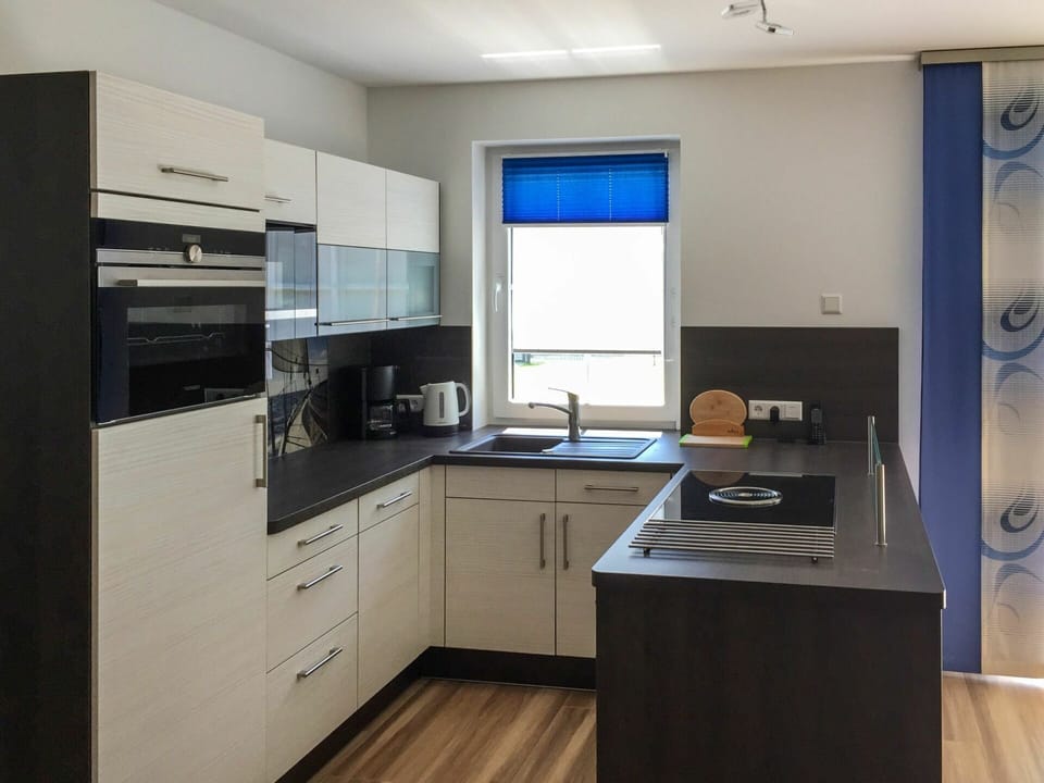 Countertop, Furniture, Room, Cabinetry, Kitchen, Property, Building, Interior Design, Major Appliance, Floor