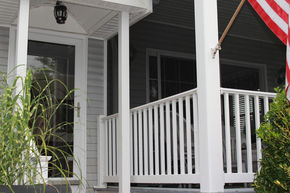 Front entrance. If you look closely you can see porch is now screened-in