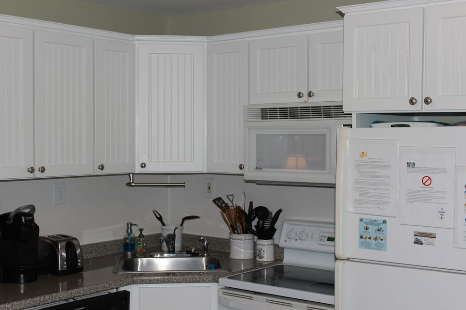 new kitchen cabinets. After picture taken I made the middle one see-thru glass