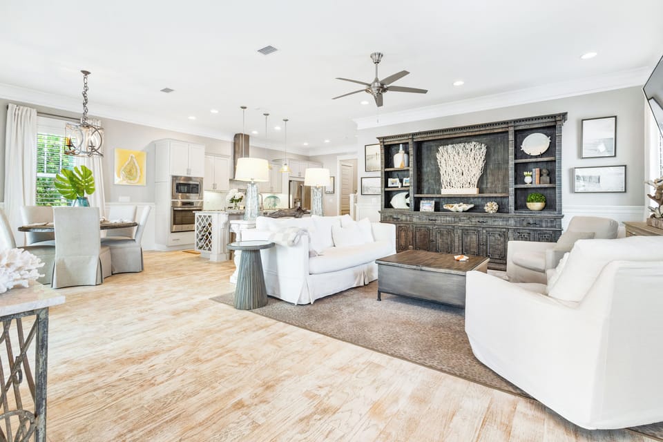 Den with large sofa, recliner, swivel rockers and 55" smart TV with soundbar