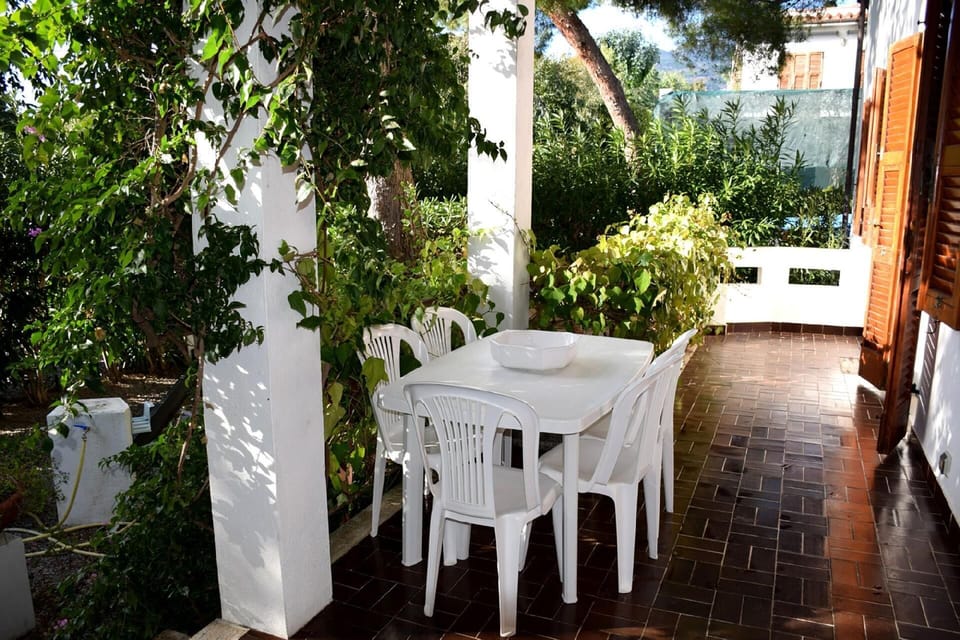 Living area. Dining table at the west porch