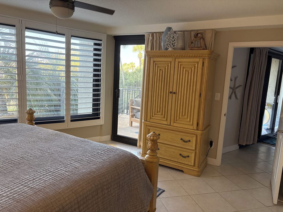 Walk out to pation from living room or master bedroom-43" TV in bedroom armoire 