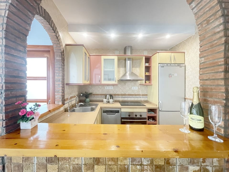 Complete and functional kitchen.