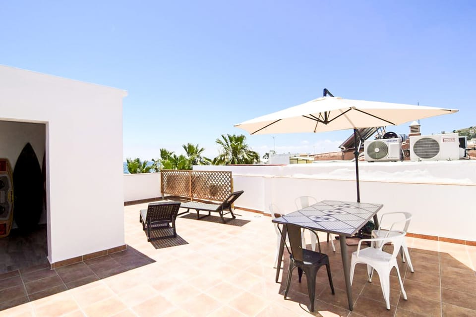 Terrace with a beautiful view of the beach, perfect for enjoying the outdoors