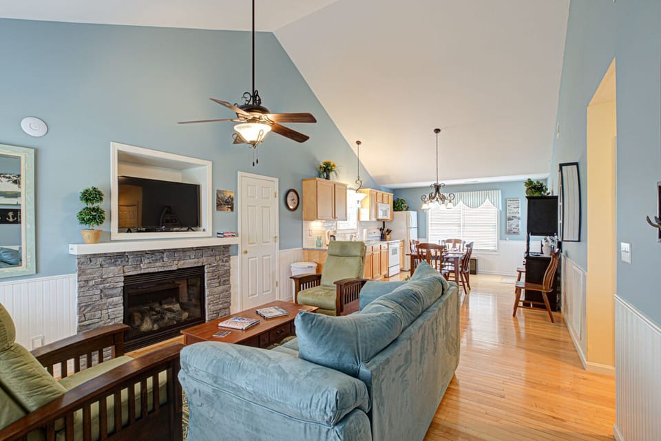 View when opening the front door.  Open floor plan with living room & kitchen.
