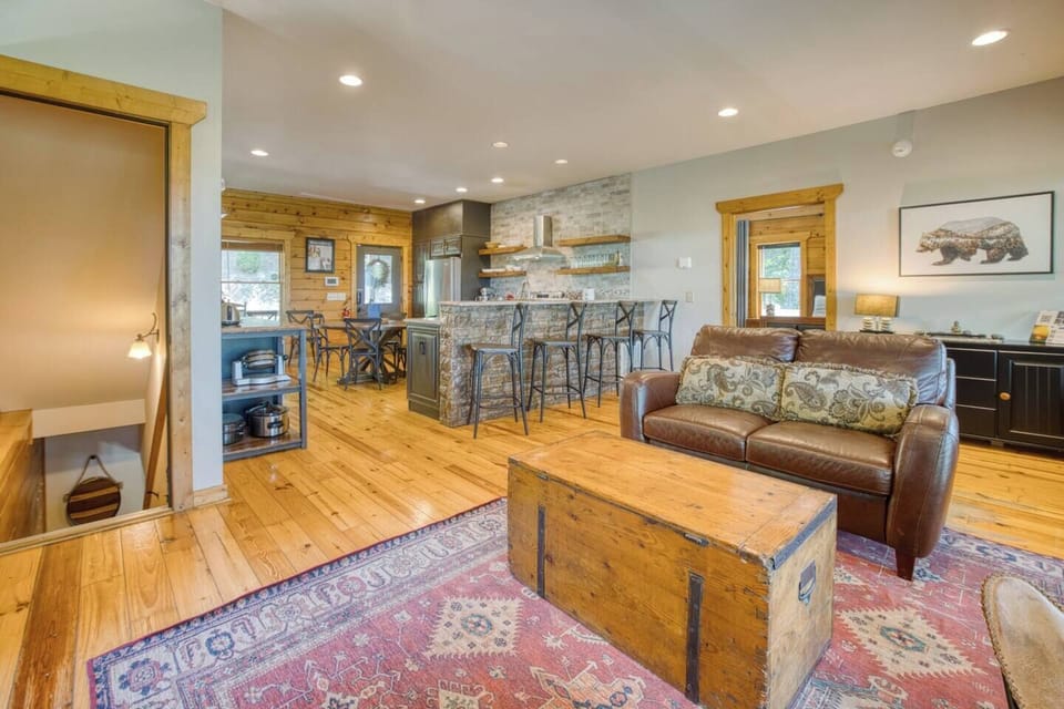 Main floor open concept kitchen and living room with  views of the mountains